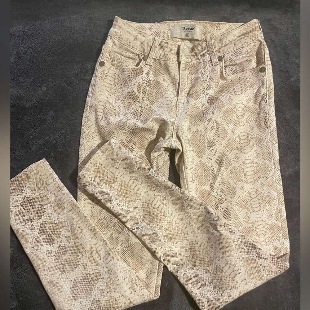 Jeans with snake print